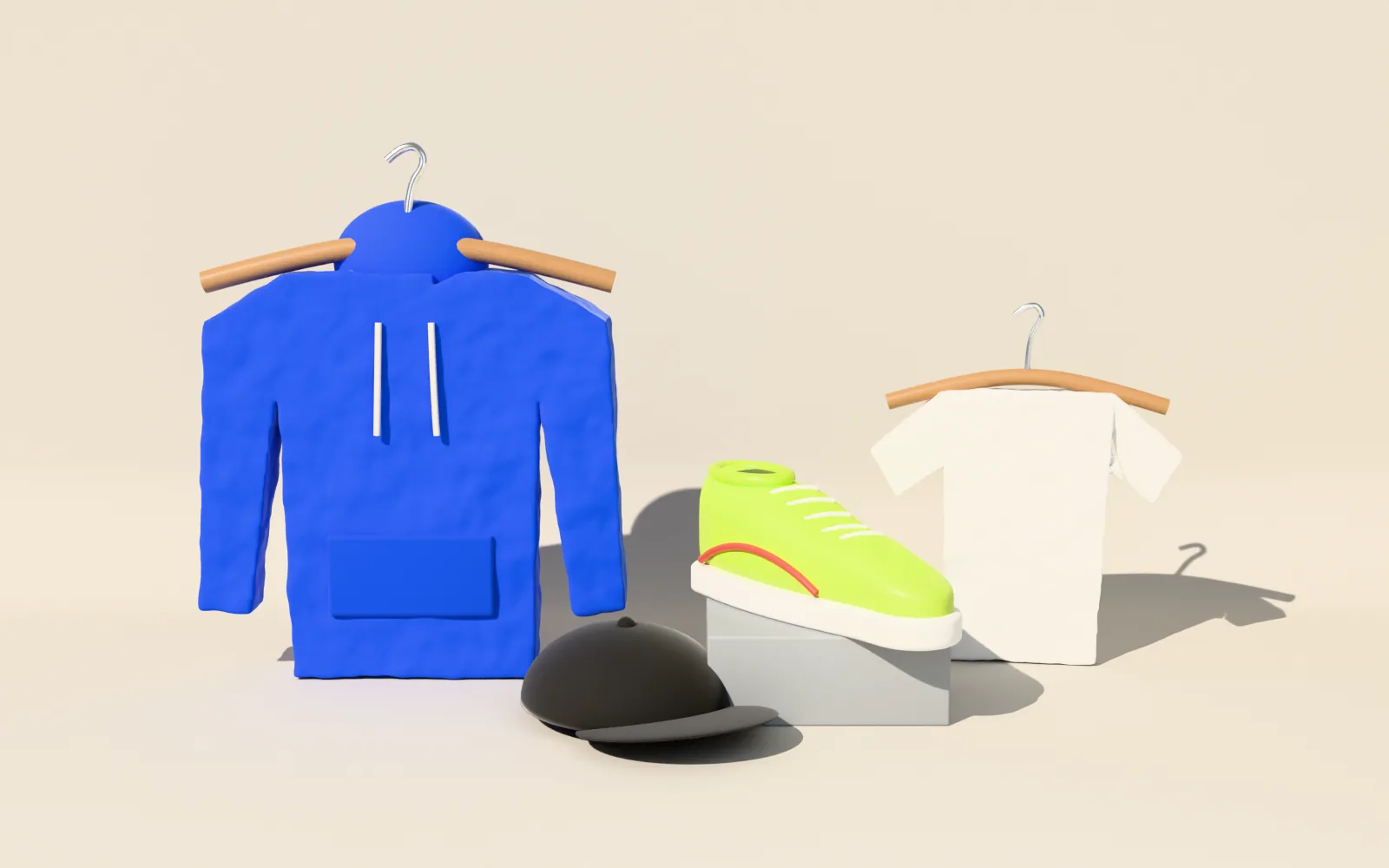 Hoodie, tee and sneaker on concrete